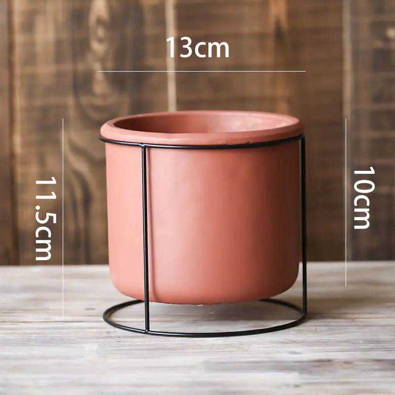 A Decorative Succulent Planter with Iron Stand measuring 13cm in diameter. The total height is 11.5cm.