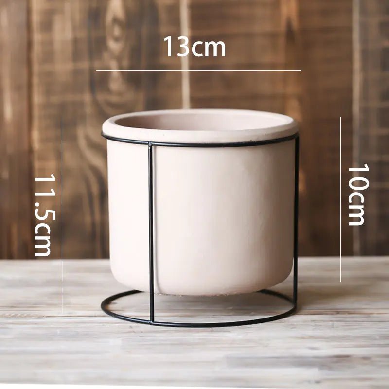 A Decorative Succulent Planter with Iron Stand measuring 13cm in diameter. The total height is 11.5cm.